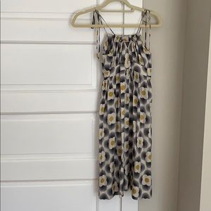 Orla Kiely dress made of 55% silk and 45% cotton.